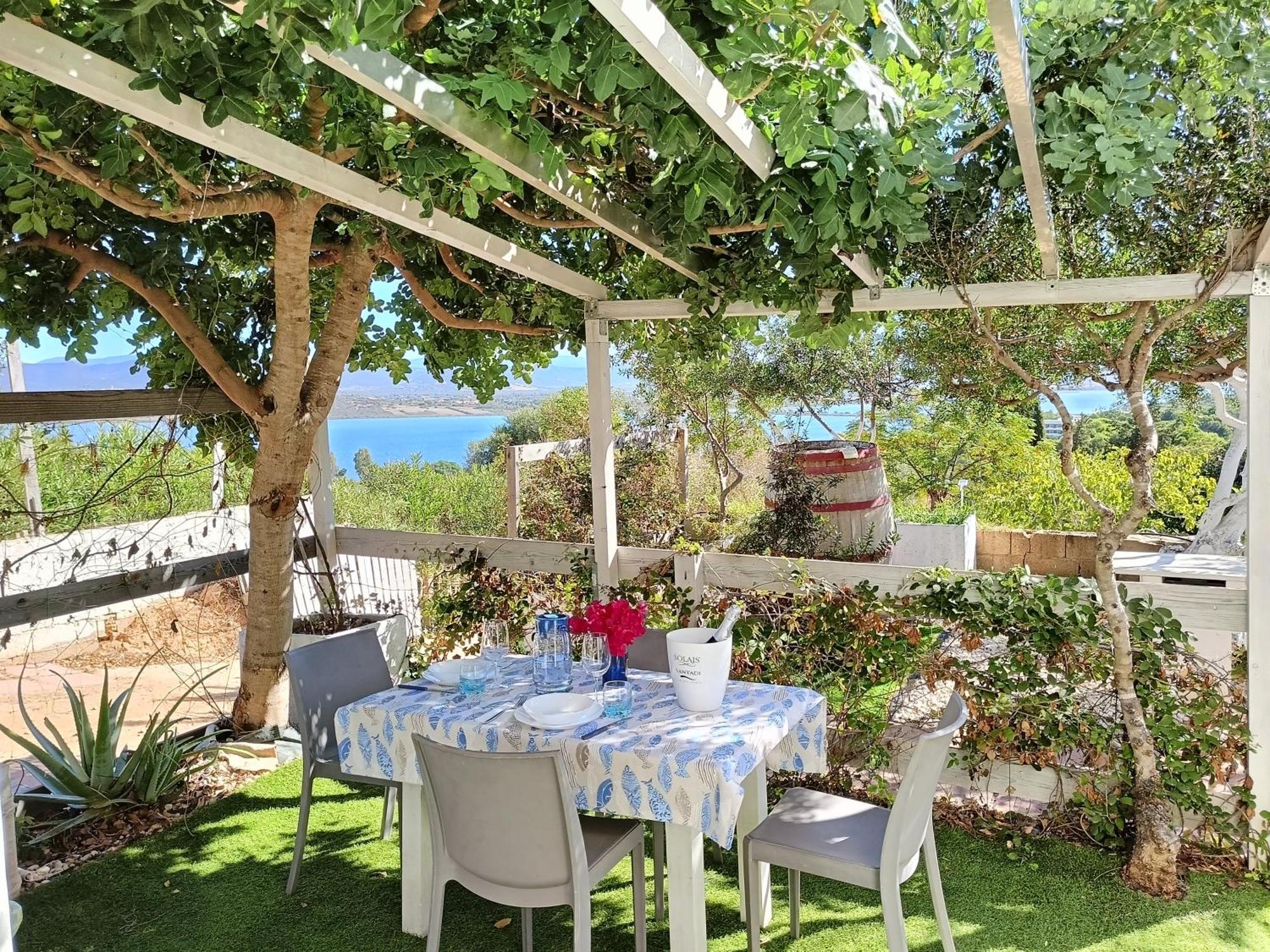 Panohome Porto Pino Exterior foto